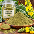 A pile of finely ground dried mullein leaf powder on a work table, ready to use for herbal preparation.